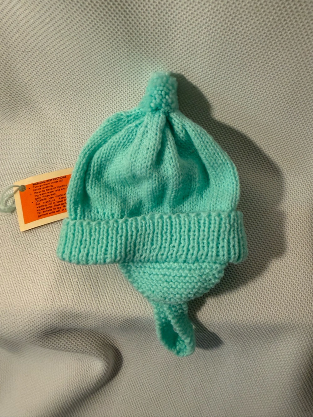 Baby hat with ear flaps green handmade with baby yarn